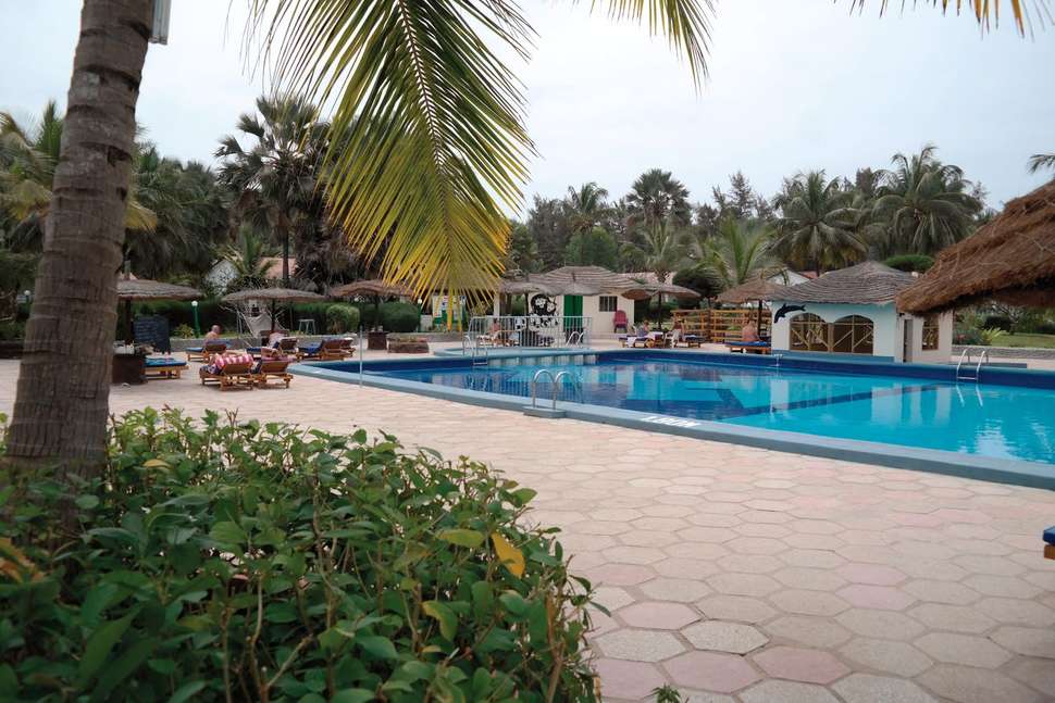Een foto van het zwembad bij Holiday Beach Club Hotel