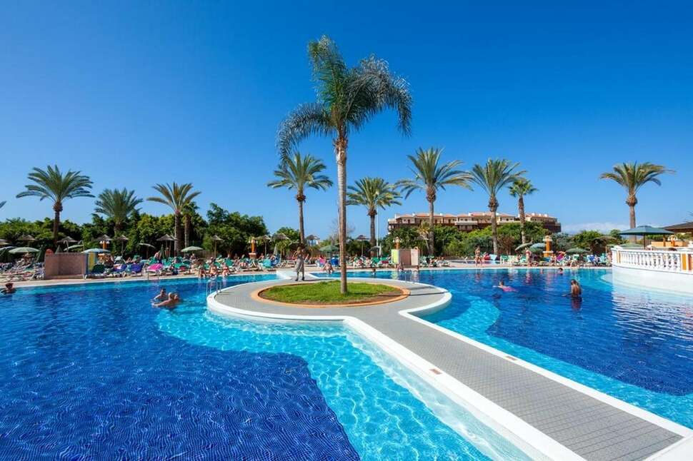 Een foto van het zwembad bij Chatur Playa Real Resort