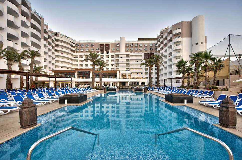 Een foto van het zwembad bij db San Antonio Hotel & Spa