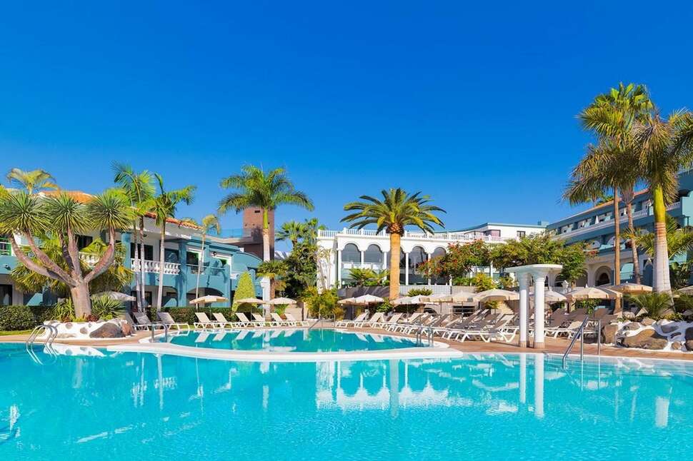 Een foto van het zwembad bij Hotel Colon Guanahani