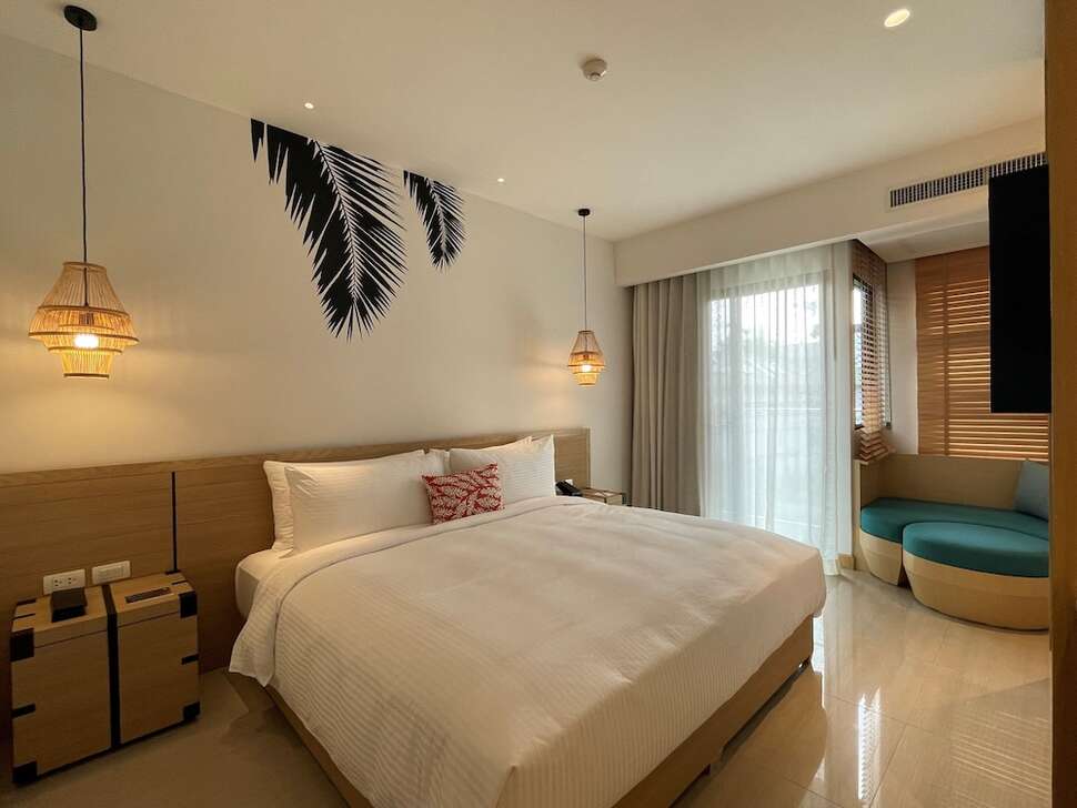 Ein Foto Outrigger Surin Beach Resort