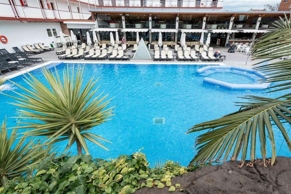 Een foto van het zwembad bij Hotel Papi