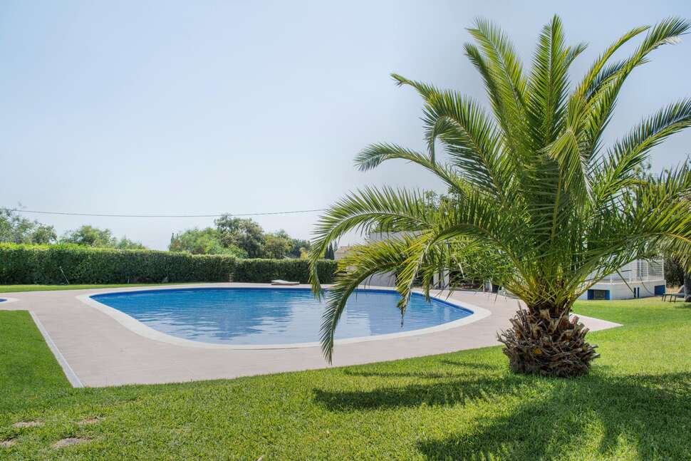 Een foto van het zwembad bij Carvoeiro Garden Hotel