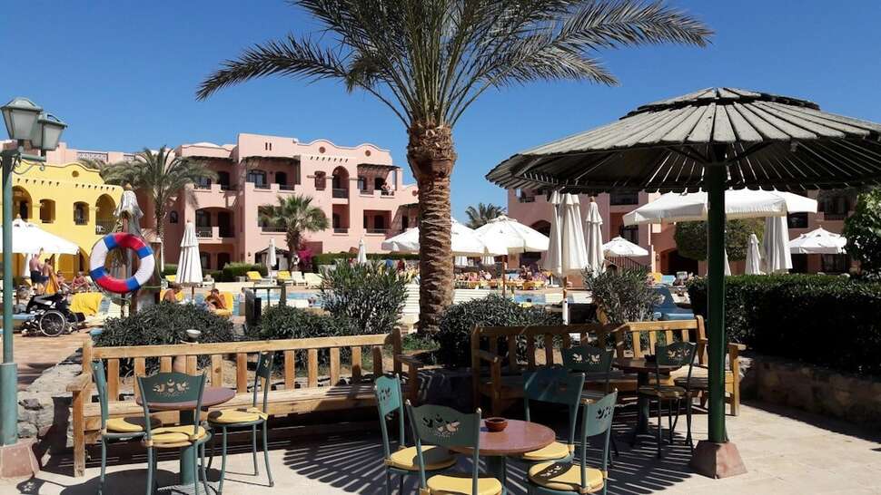 Een foto van het terras bij The Three Corners Rihana Inn