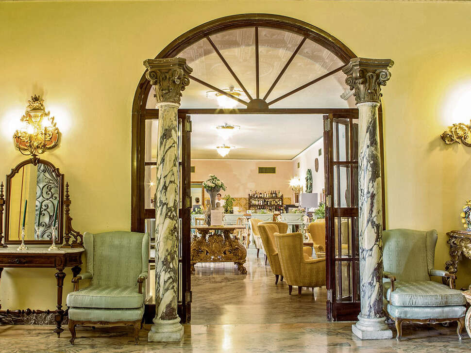 Een foto van het interieur van Taormina Park Hotel