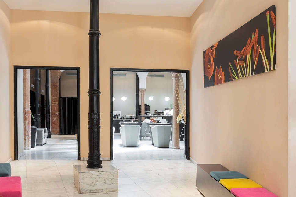 Een foto van het interieur van Petit Palace Plaza Malaga Hotel