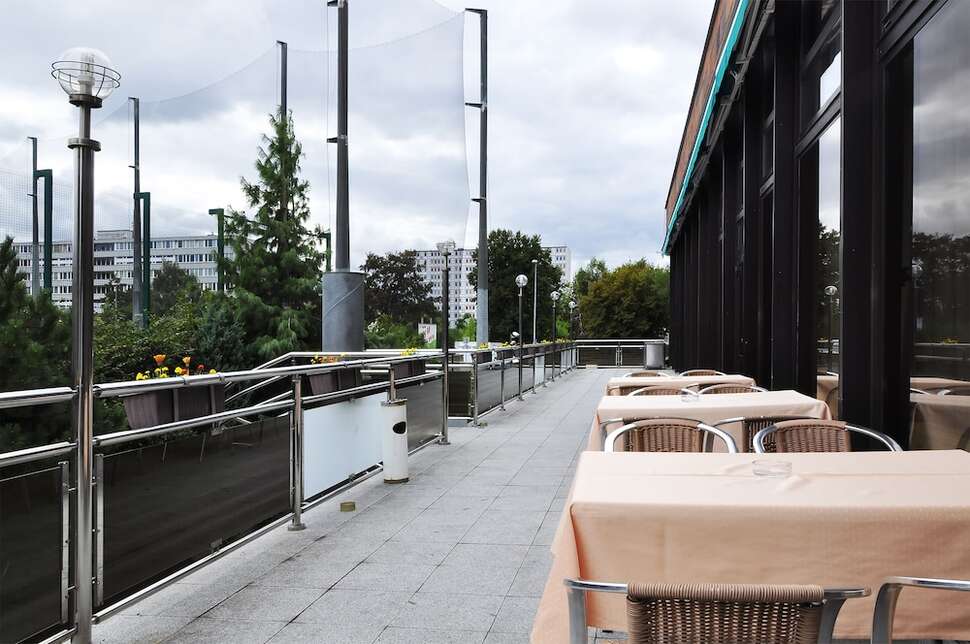 Een foto van het terras bij Hotel Olympik