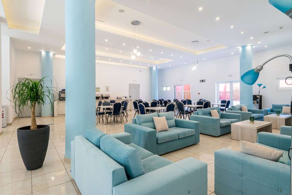 Een foto van het interieur van Santa Maria City Hotel