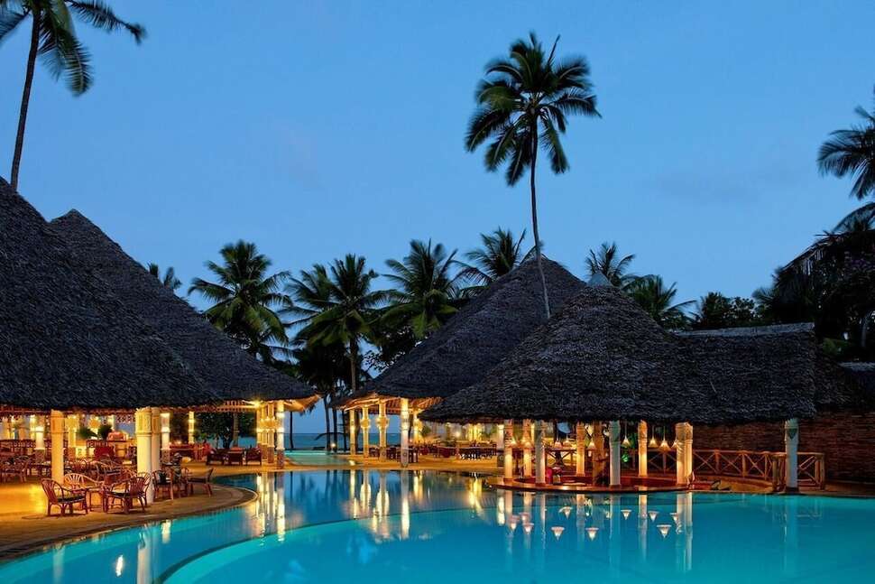 Een foto van het zwembad bij Neptune Village Beach Resort & Spa