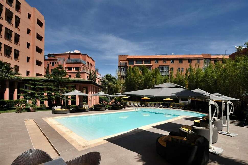 Een foto van het zwembad bij Hotel Novotel Marrakech Hivernage