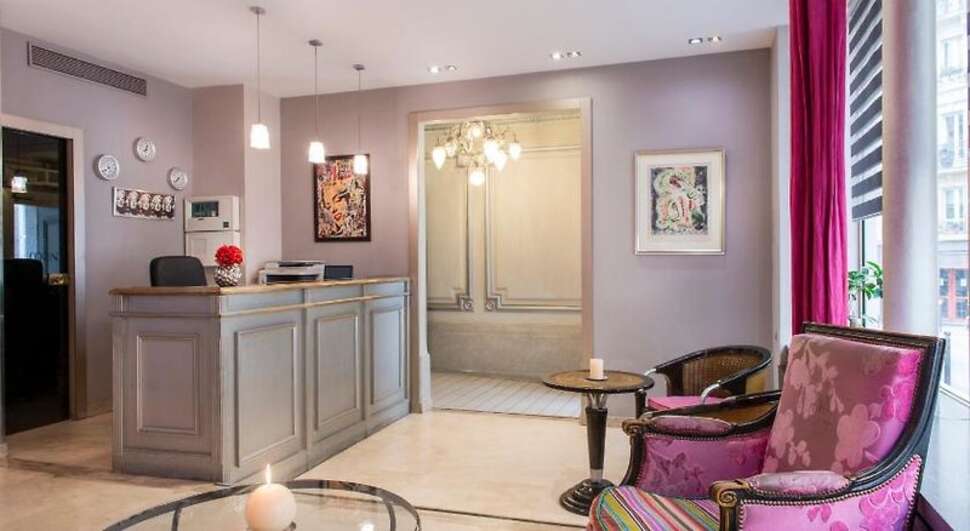 Een foto van het interieur van Hotel Corona Rodier