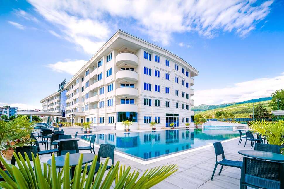 Een foto van het zwembad bij Unique Resort & Spa