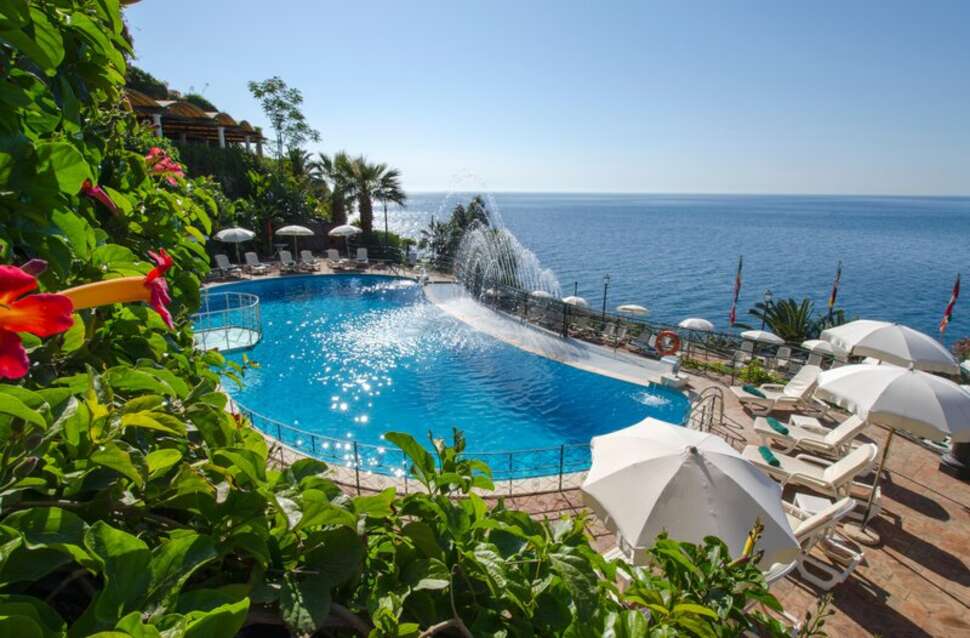 Een foto van het zwembad bij Baia Taormina Hotel