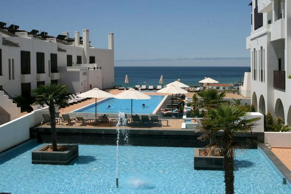 Een foto van het zwembad bij Belmar Spa & Beach Resort