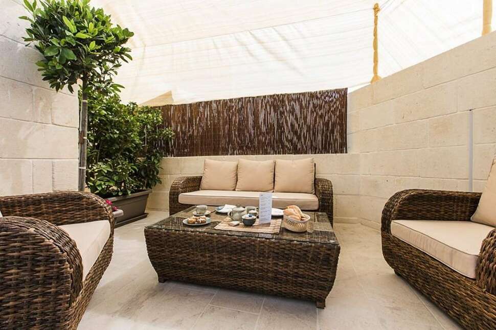 Een foto van het terras bij Murella Living