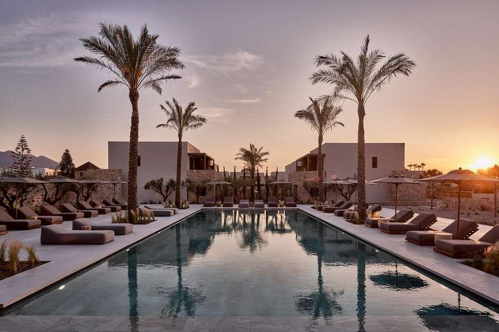 Een foto van het zwembad bij Theros All Suite Hotel
