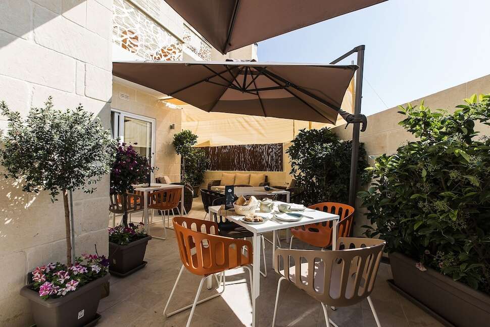 Een foto van het terras bij Murella Living
