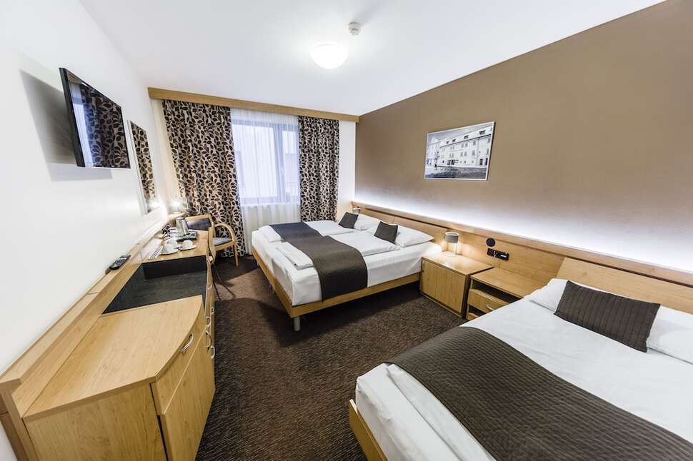 Ein Foto Hotel Archibald City