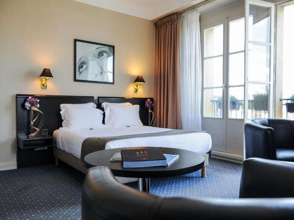 Ein Foto Le Grand Hotel 