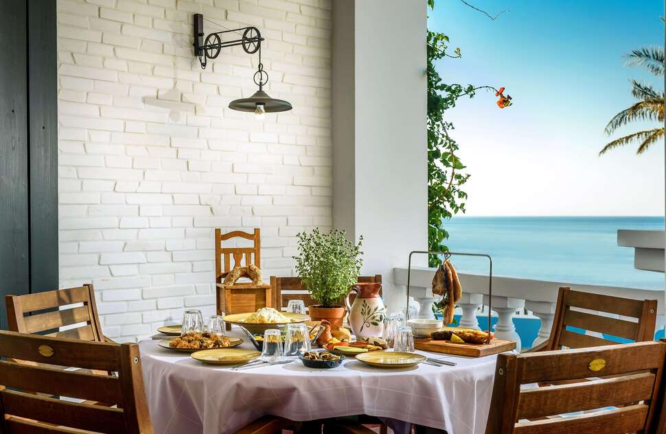 Een foto van het terras bij Minos Imperial Luxury Beach Resort & Spa