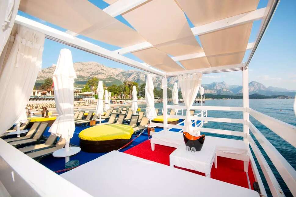 Een foto van het strand bij Orange County Kemer Resort Hotel