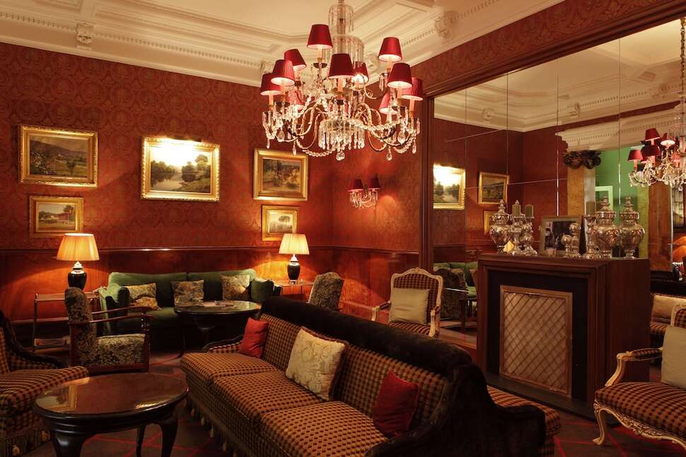 Een foto van het interieur van Grande Hotel Do Porto