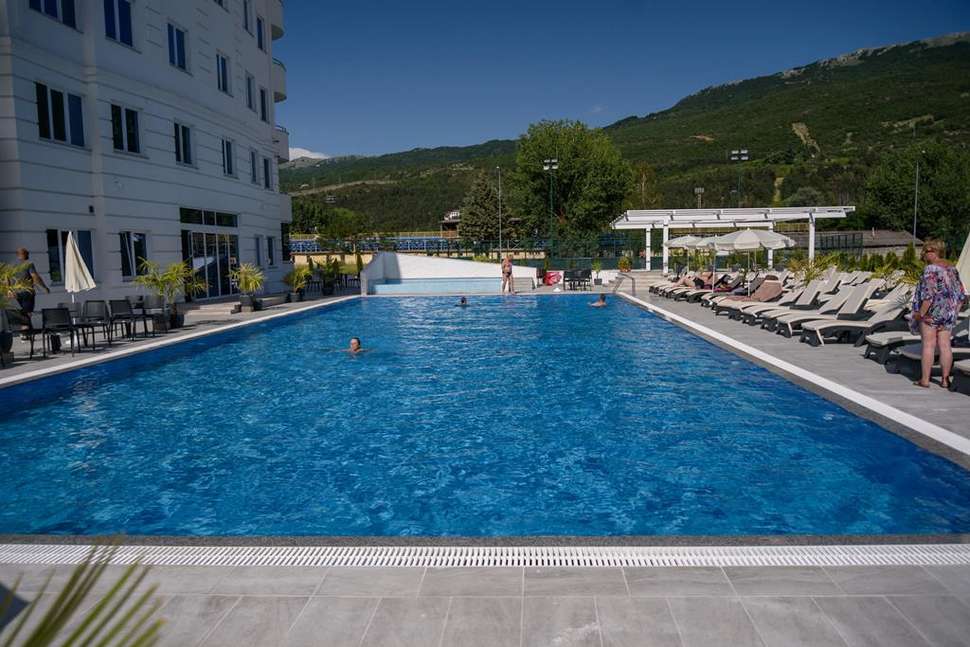 Een foto van het zwembad bij Unique Resort & Spa