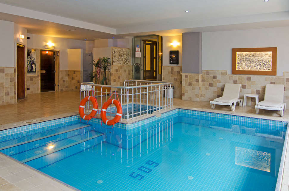 Een foto van het zwembad bij Garden of Sun Hotel