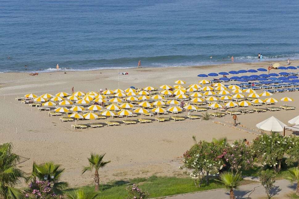 Een foto van het strand bij Hotel Monte Carlo