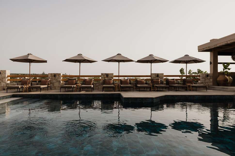 Een foto van het zwembad bij Momi Slow Living Hotel