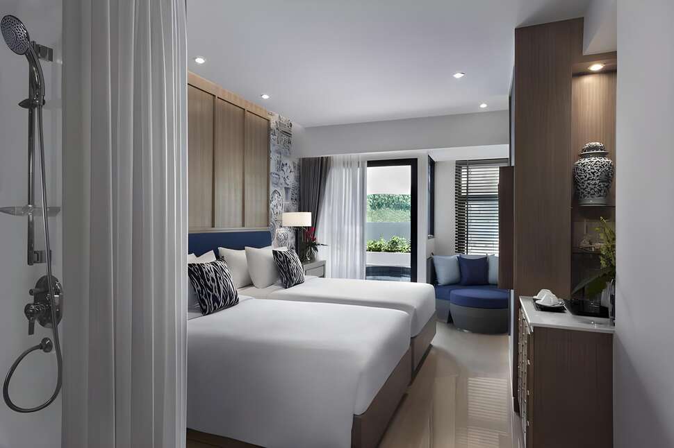 Ein Foto Outrigger Surin Beach Resort