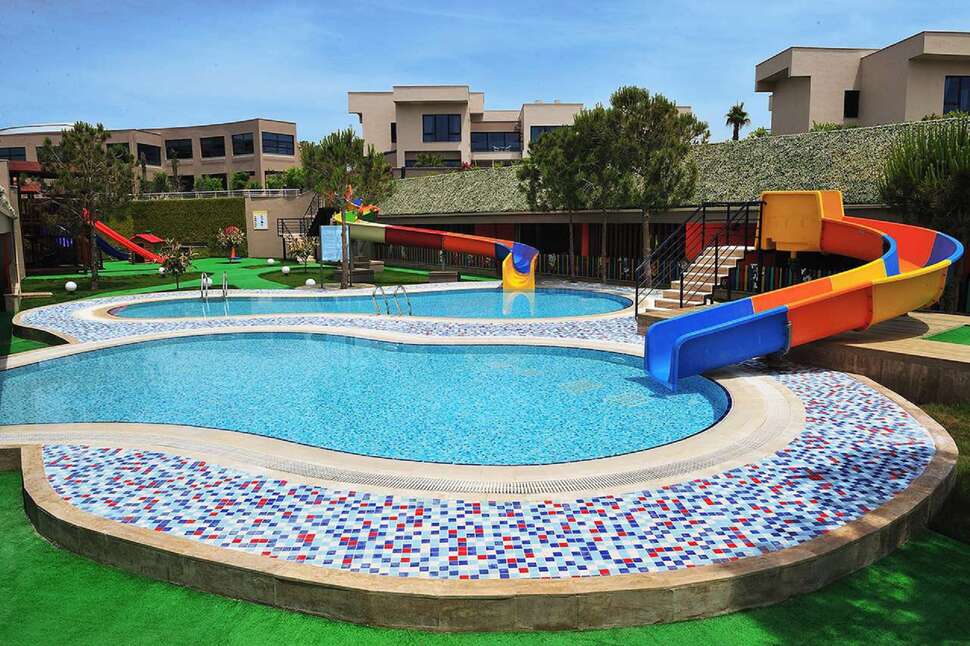 Een foto van het zwembad bij Susesi Luxury Resort