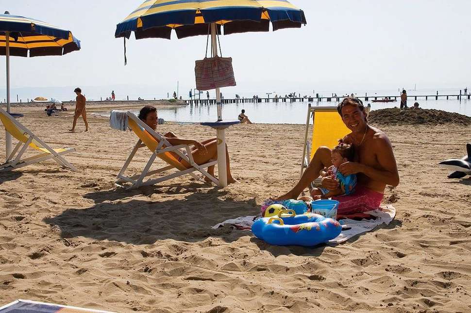 Een foto van het strand bij Club Del Sole Tenuta Primero Grado Family Collection