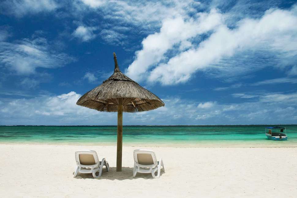 Ein Foto vom Strand beim Sunrise Attitude