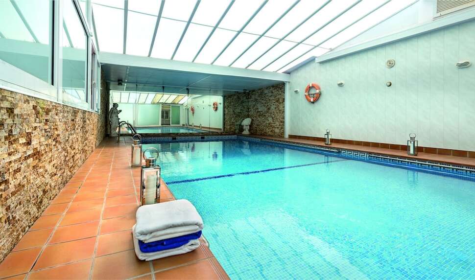 Een foto van het zwembad bij Izan Cavanna Hotel