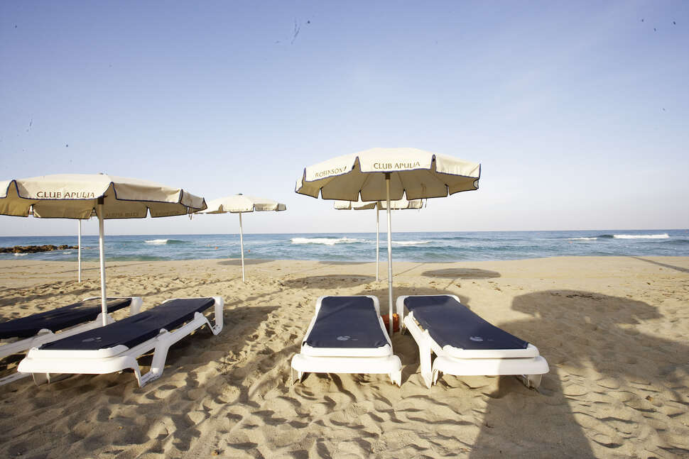 Een foto van het strand bij Robinson Club Apulia
