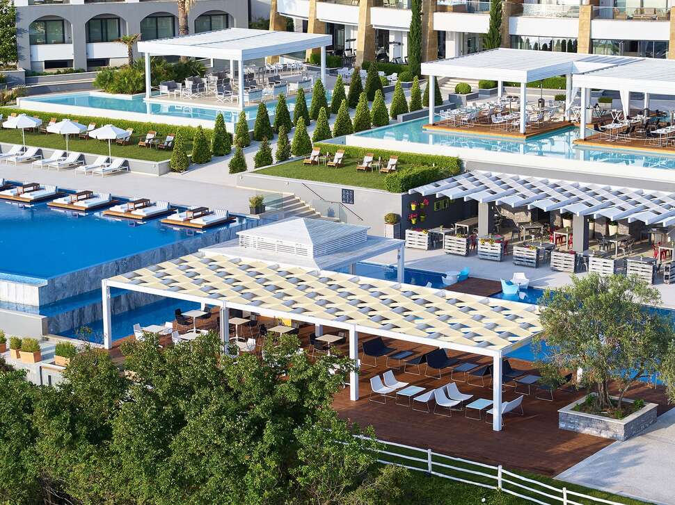 Een foto van het zwembad bij Cavo Olympo Luxury Hotel & Spa