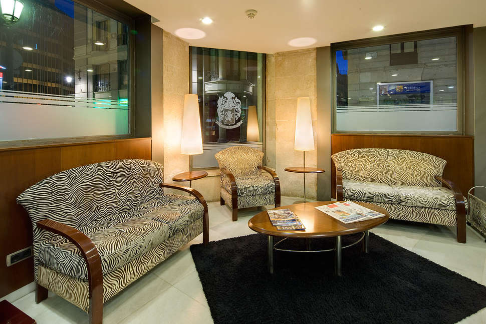 Een foto van het interieur van Hotel Suizo