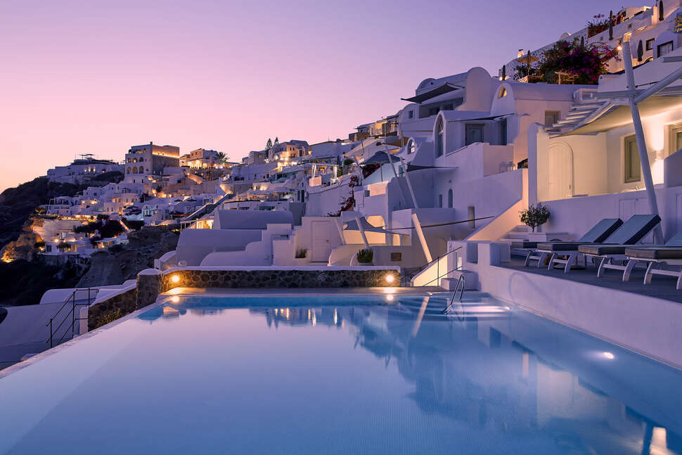 Een foto van het zwembad bij La Perla Villas & Suites