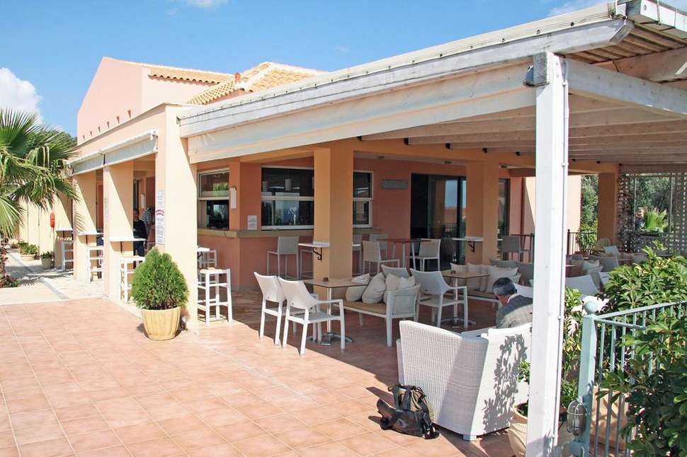 Een foto van het terras bij Astra Village Hotel & Spa