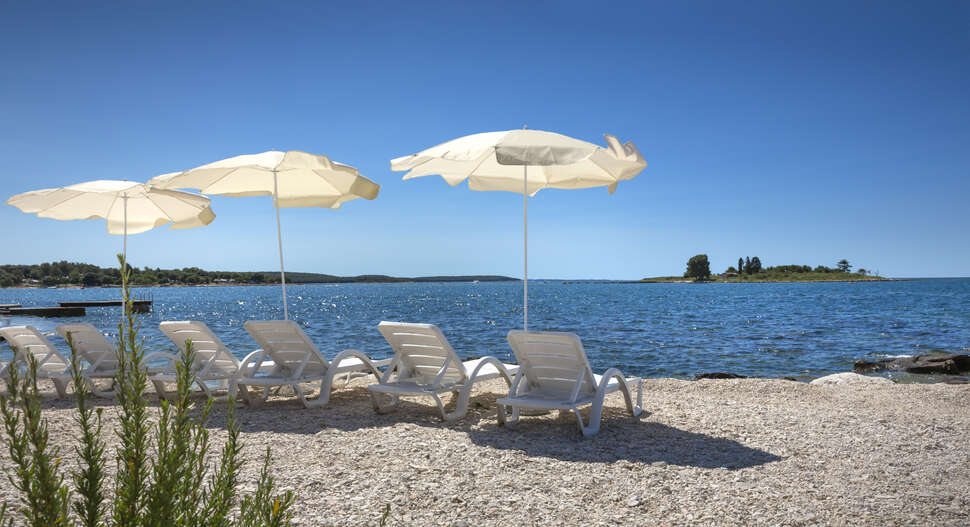 Een foto van het strand bij Resort Villas Rubin
