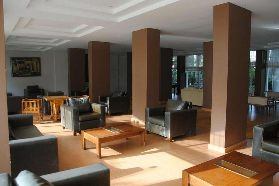 Een foto van het interieur van Hotel Flora Suites