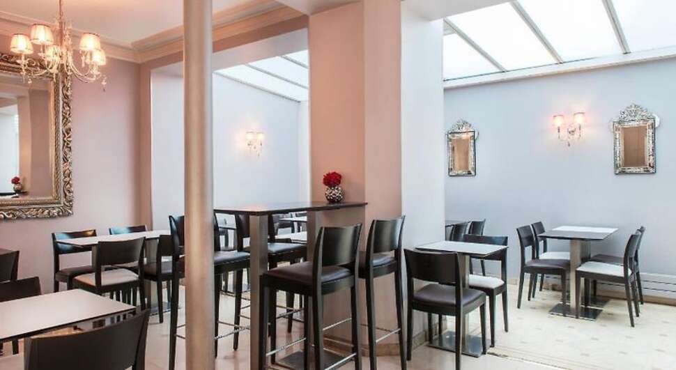 Een foto van het interieur van Hotel Corona Rodier