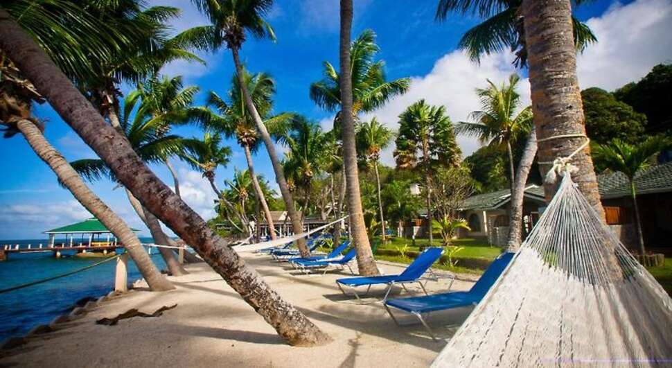 Een foto van het strand bij Coco de Mer & Black Parrot Suites