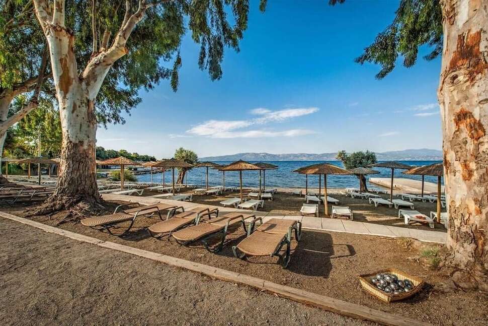Een foto van het strand bij Evia Riviera Resort