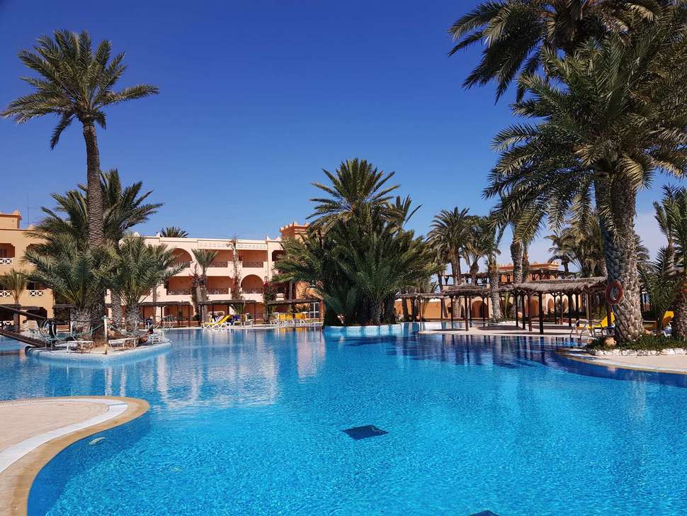 Een foto van het zwembad bij Vincci Safira Palms