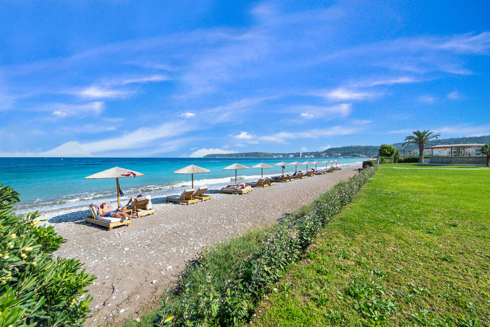 Een foto van het strand bij Ixia Dream Beachfront Hotel