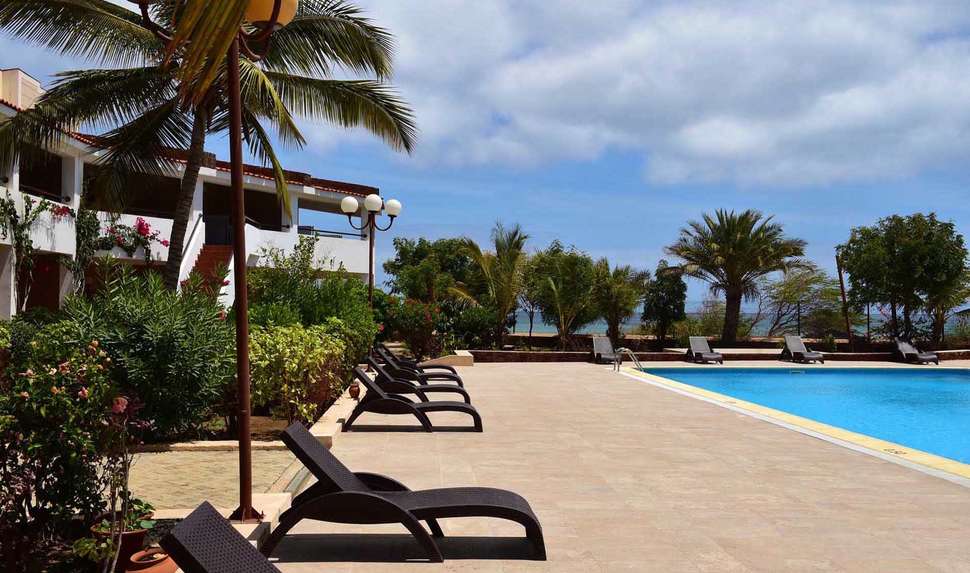 Een foto van het zwembad bij Pestana Tropico