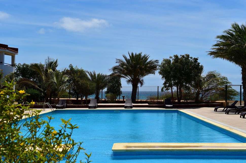 Een foto van het zwembad bij Pestana Tropico