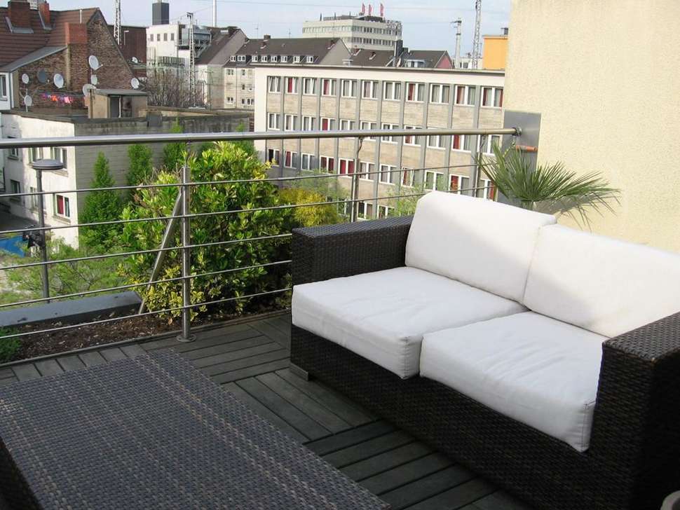 Een foto van het terras bij Classic Hotel Harmonie